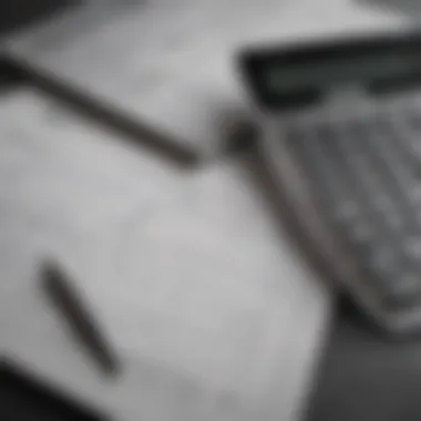 Budgeting Tools A close-up of a calculator and budgeting sheets