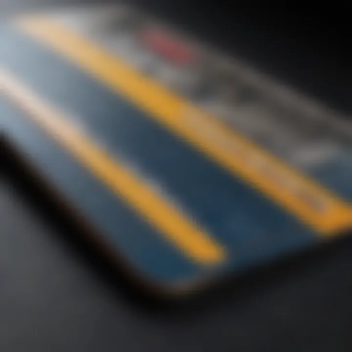 Close-up of a credit card with financial documents